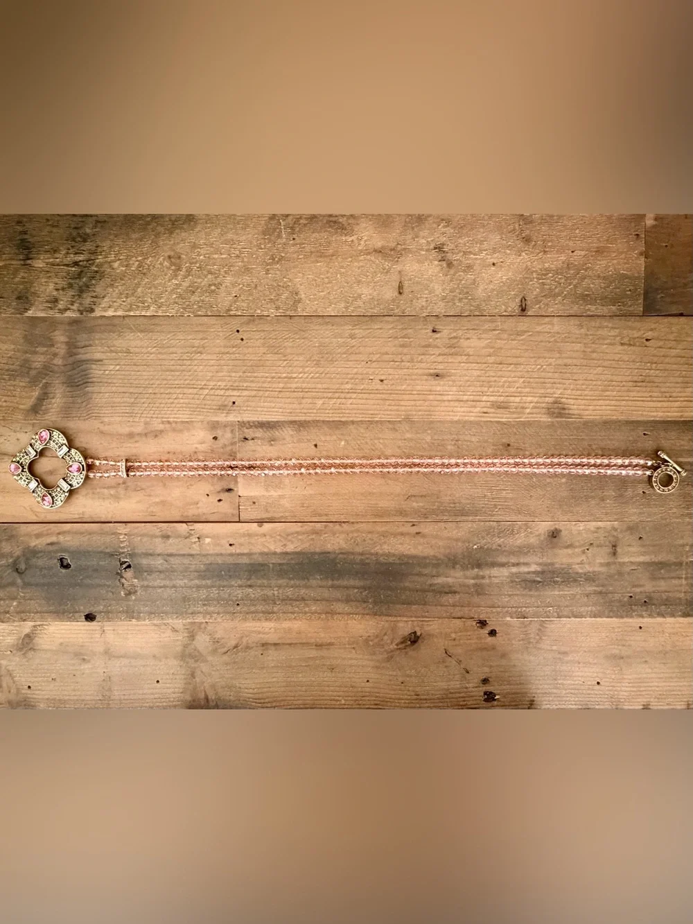 HEIDI DAUS PINK BEADED CRYSTAL NECKLACE FEATURING A QUATREFOIL-SHAPED PENDANT